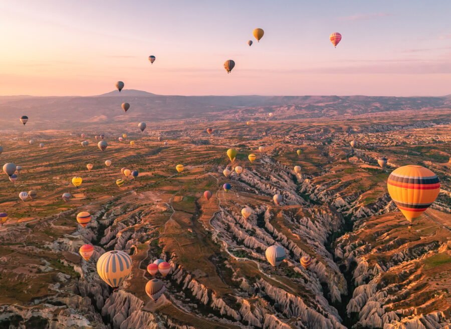 Cappadocia Turkey sunrise in the hills with hot air balloons, Kapadokya Turkey Goreme