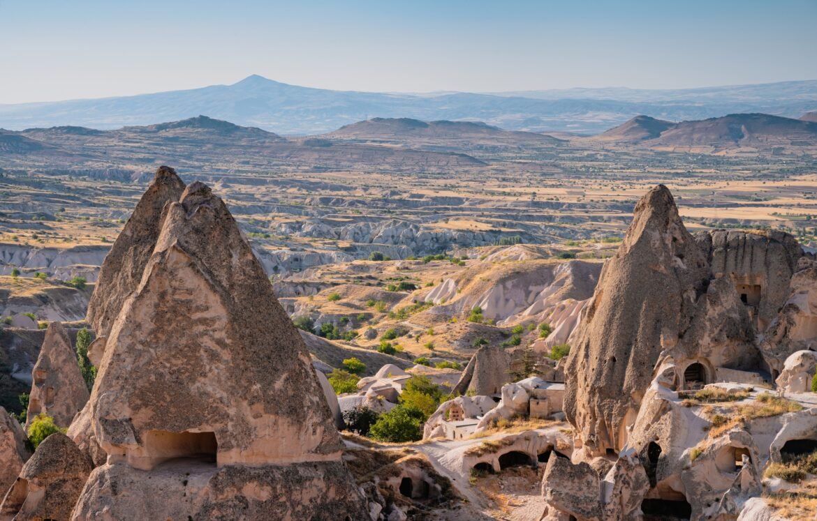 Cappadocia valley with cave houses in the foreground